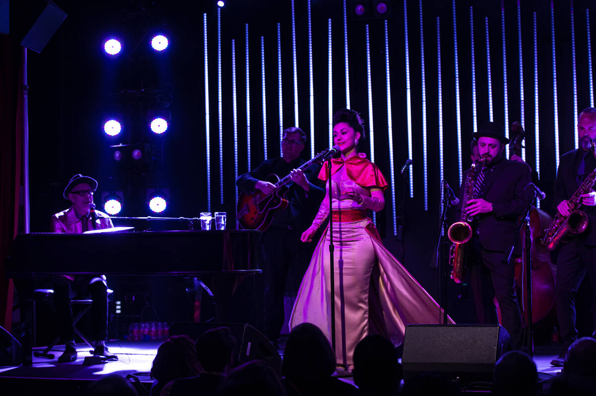 Jeff Goldblum, left, performs with Melody Sweets, center right, and the Mildred Snitzer Orchest ...