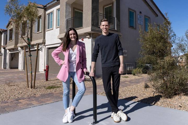 Lauren Self, co-founder and CEO of Roots Homes, and Sam Barsness, co-founder, pose for a photo ...