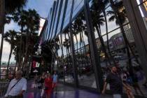 Pedestrians walk outside The Cosmopolitan of Las Vegas, Wednesday, June 8, 2022. The resort sol ...