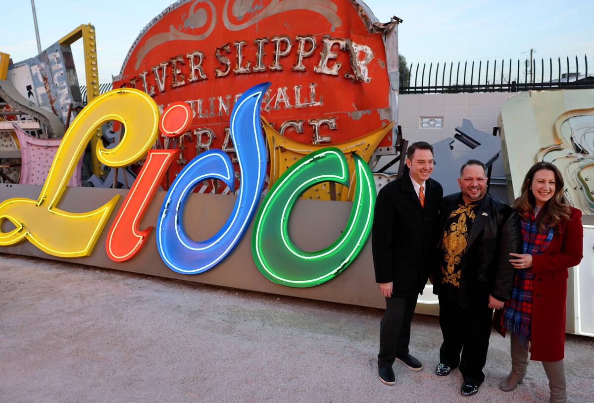 Artist, philanthropist and historian Todd VonBastiaans, center, poses with Neon Museum Executiv ...