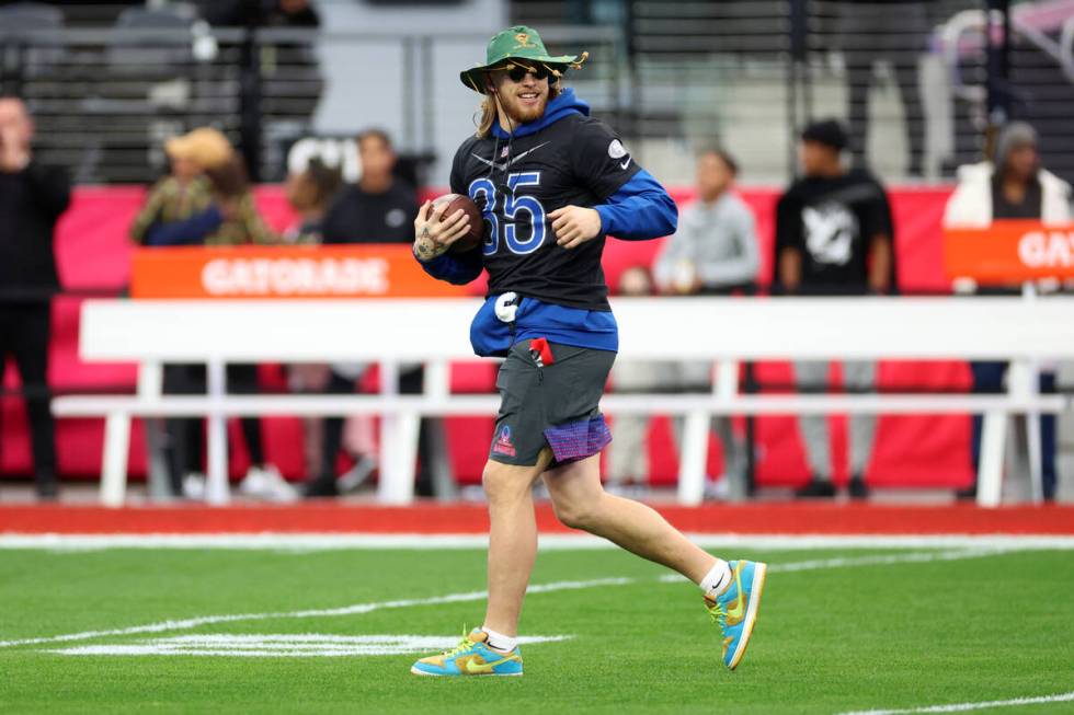 San Francisco 49ers' George Kittle runs the ball after a catch during a Pro Bowl rehearsal even ...