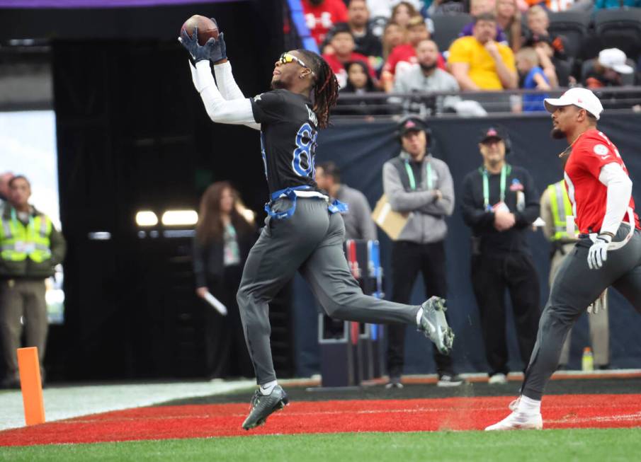 Dallas Cowboys wide receiver CeeDee Lamb (88) makes a touchdown catch during the NFL Pro Bowl G ...