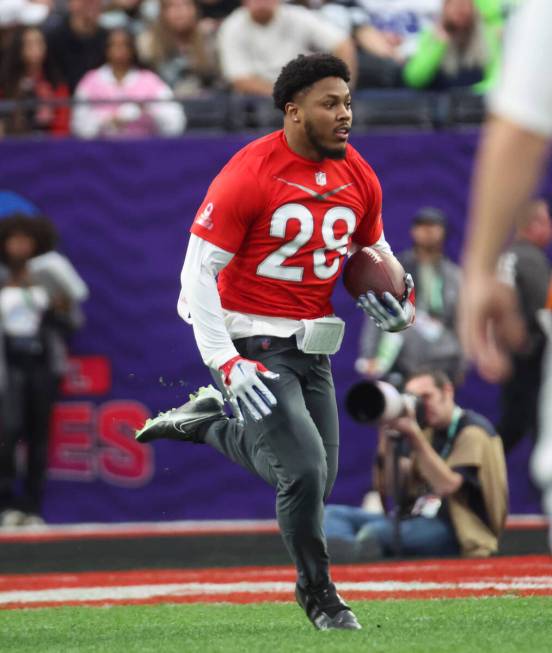 Las Vegas Raiders running back Josh Jacobs (28) runs the ball during the NFL Pro Bowl Games at ...