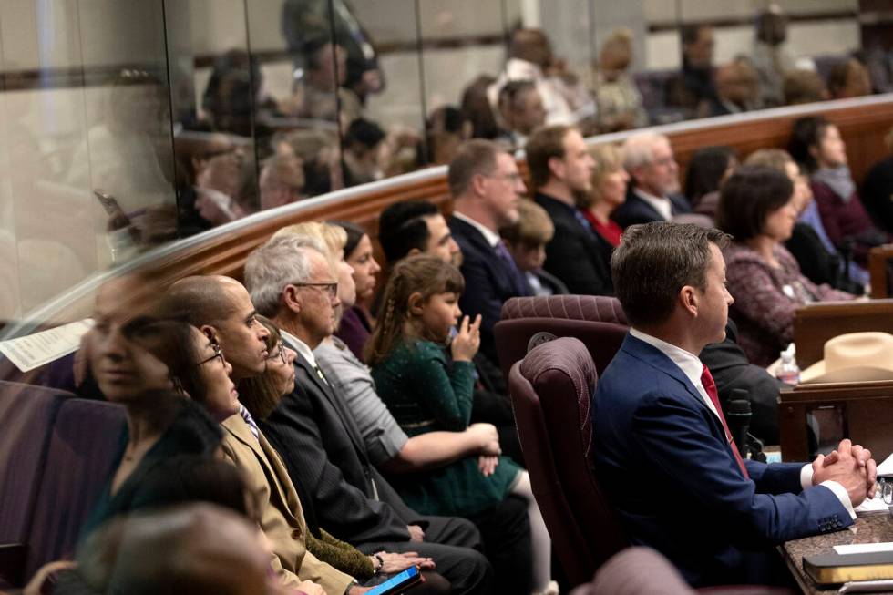 The Assembly, including Assemblyman Brian Hibbets, R-Las Vegas, right, is in session for the fi ...