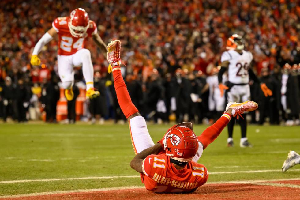 Kansas City Chiefs wide receiver Marquez Valdes-Scantling (11) falls into the end zone for a to ...