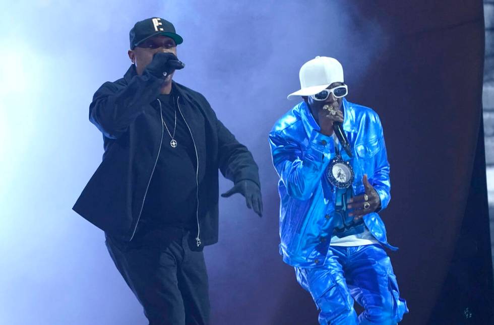 Chuck D, left, and Flavor Flav perform "Rebel Without a Pause" at the 65th annual Gra ...