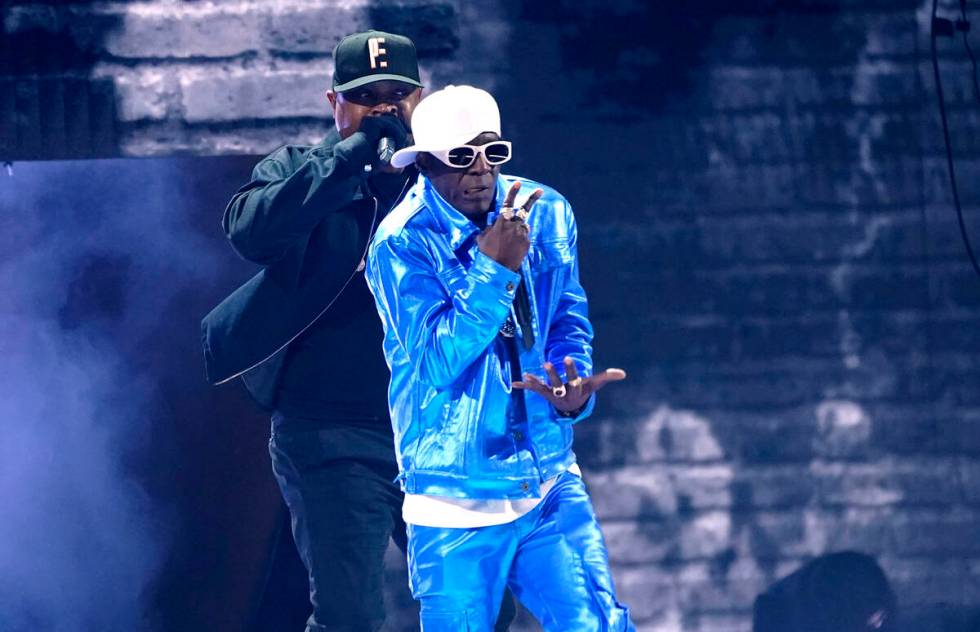 Chuck D, left, and Flavor Flav perform "Rebel Without a Pause" at the 65th annual Gra ...