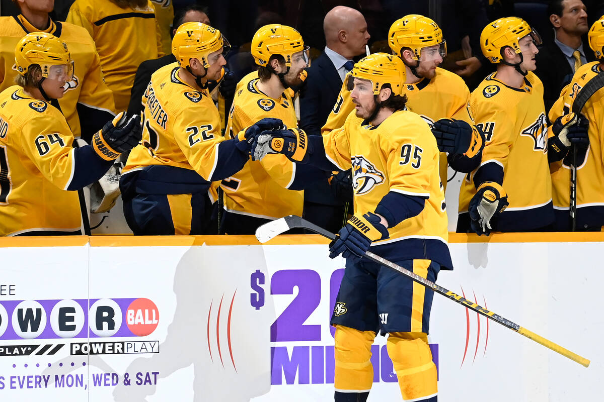 Nashville Predators center Matt Duchene (95) is congratulated after scoring against the Vegas G ...