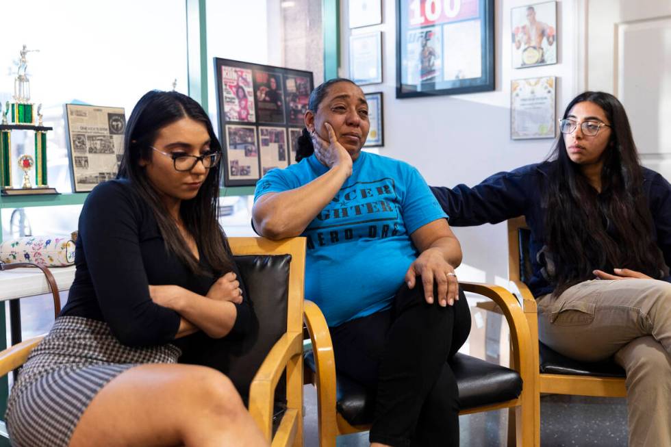 Navia Gonzalez, center, with her daughters Samantha Smith, left, and Florencia Gonzalez, are in ...