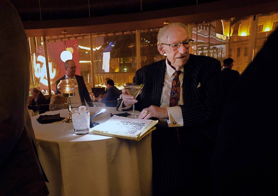 Oscar Goodman talks with guests before the Oscar's Dinner Series, Wednesday, Feb. 8, 2023, at O ...