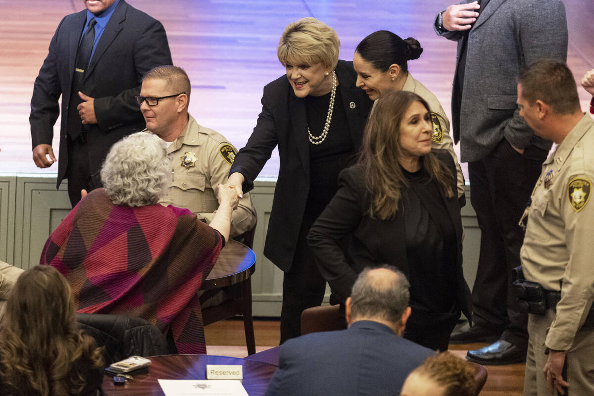 Mayor Carolyn Goodman, center, is greeted at her arrival to the Metropolitan Police Department ...