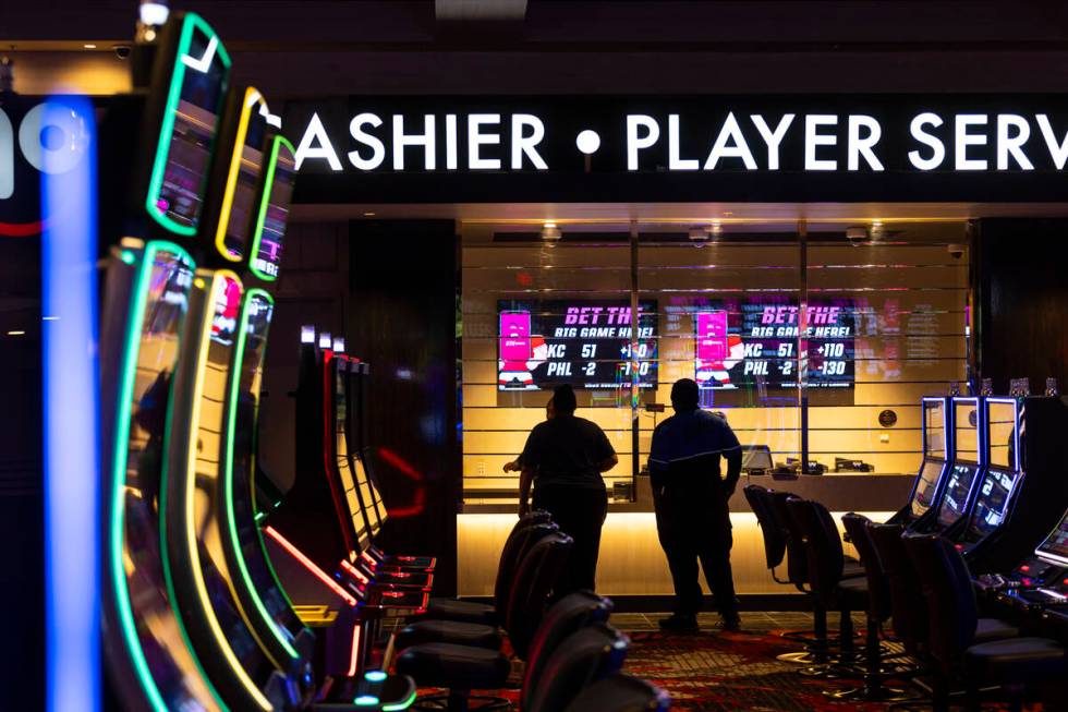 People stand by the player services and cashier cage at Wildfire Casino, slated to open this Fr ...