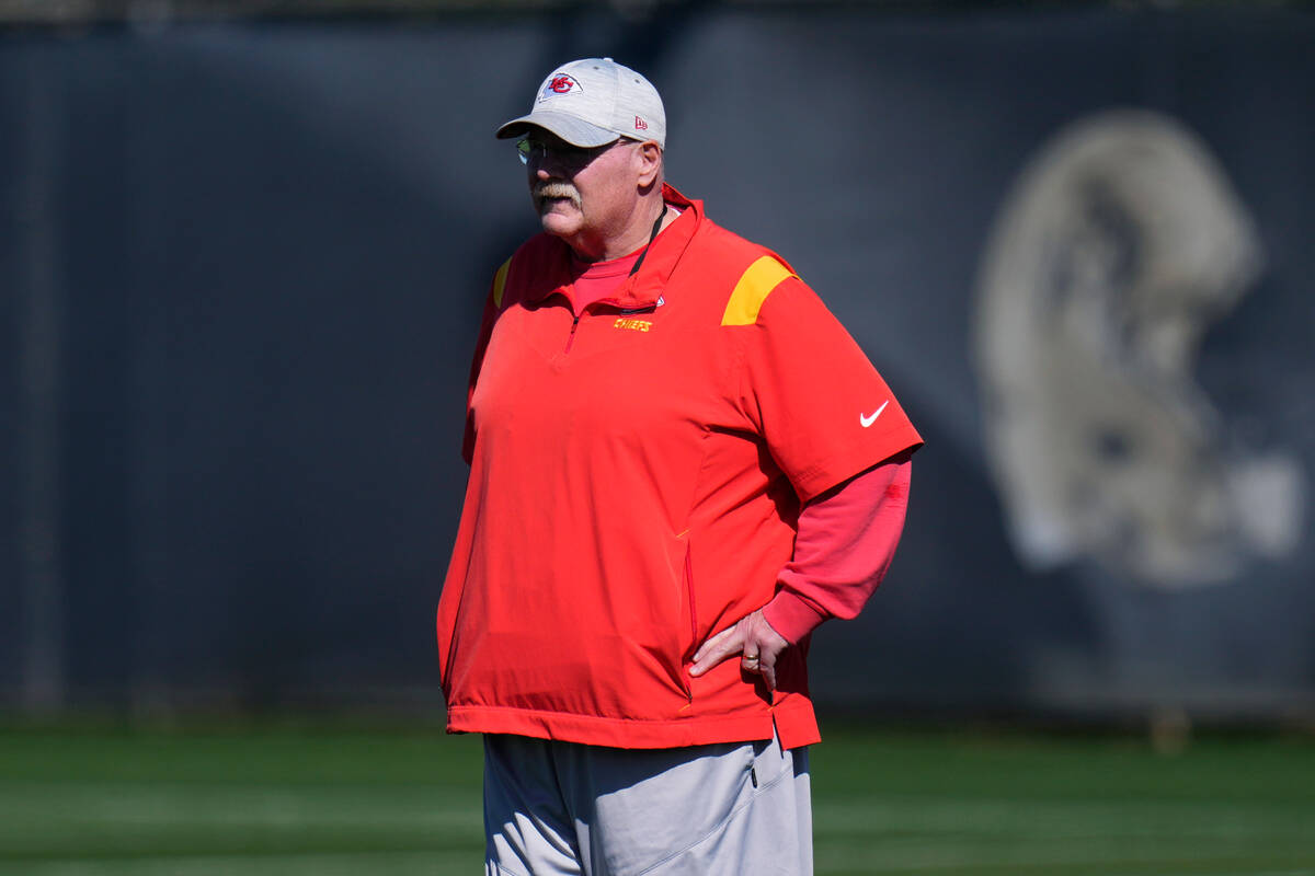 Kansas City Chiefs head coach Andy Reid watches his players during an NFL football practice in ...