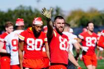 Kansas City Chiefs tight end Travis Kelce (87) waves to the sidelines as he warms up with teamm ...