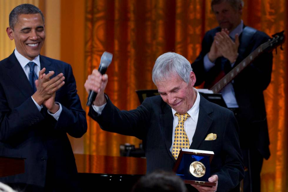 President Barack Obama applauds after presenting songwriter Burt Bacharach with a 2012 Library ...