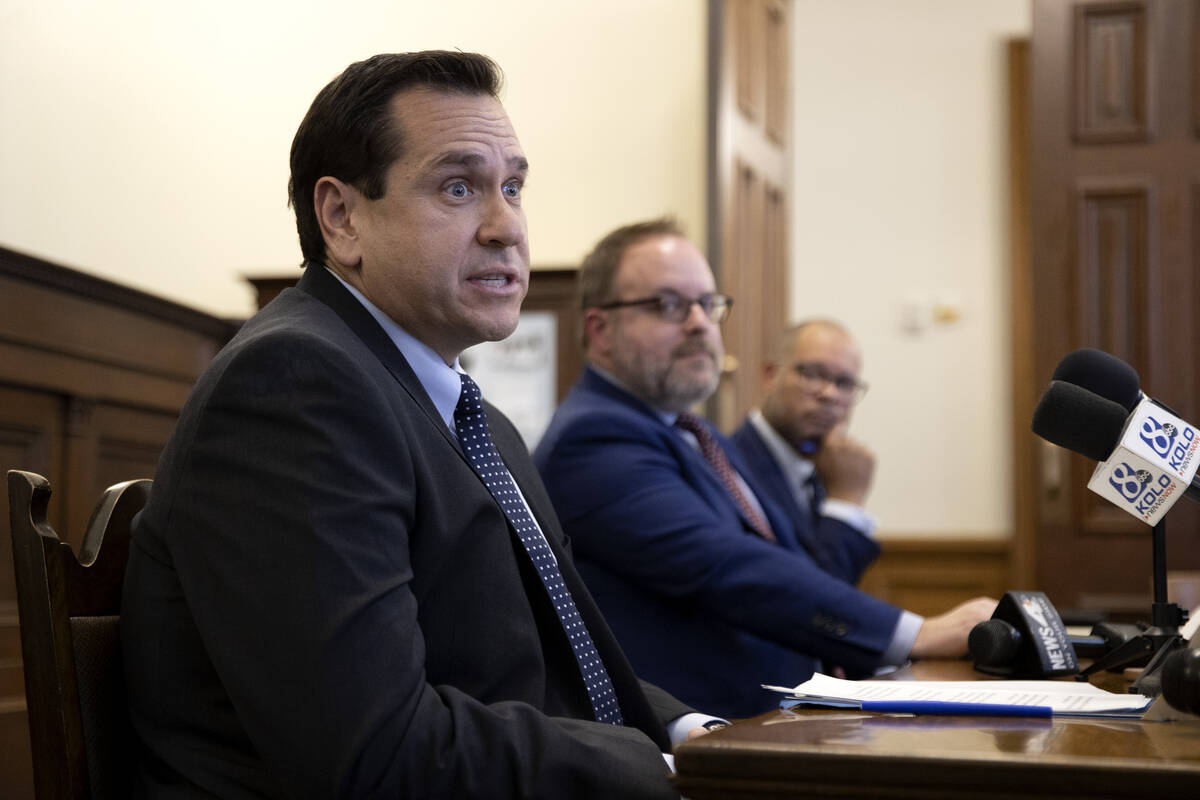 Nevada Secretary of State Cisco Aguilar speaks while Treasurer Zach Conine and Attorney General ...