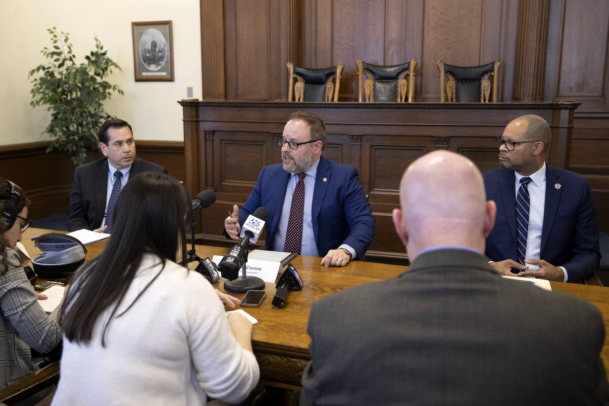 Nevada Treasurer Zach Conine, center, answers question flanked by Secretary of State Cisco Agui ...