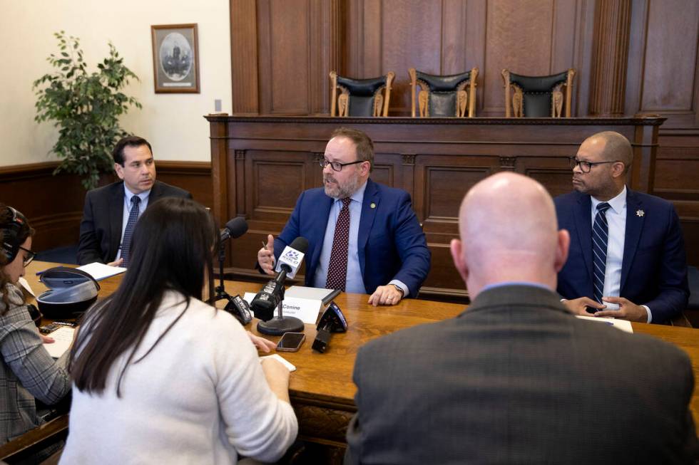 Nevada Treasurer Zach Conine, center, answers question flanked by Secretary of State Cisco Agui ...