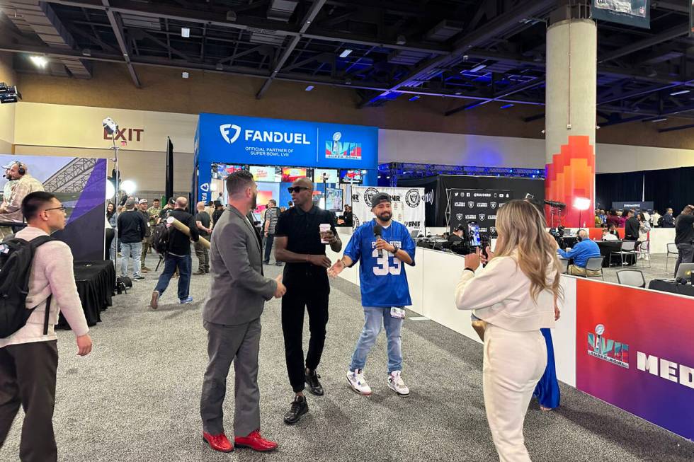 Chad "Ochocinco" Johnson is interviewed in radio row during Super Bowl LVII week at the Phoenix ...