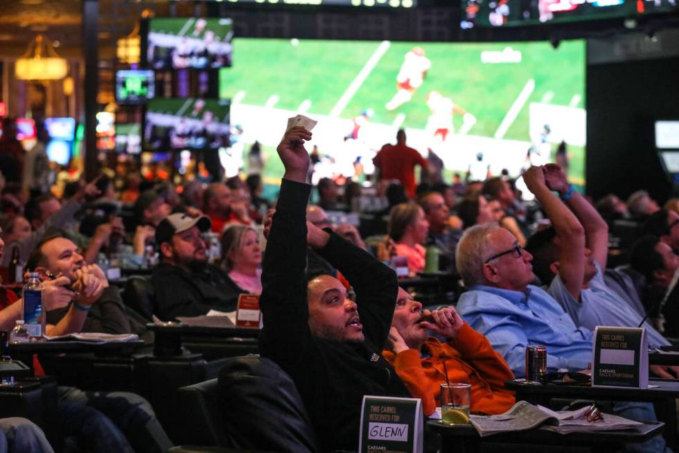 Attendees watch Super Bowl LVII at Caesars Palace sportsbook in Las Vegas, Sunday, Feb. 12, 202 ...