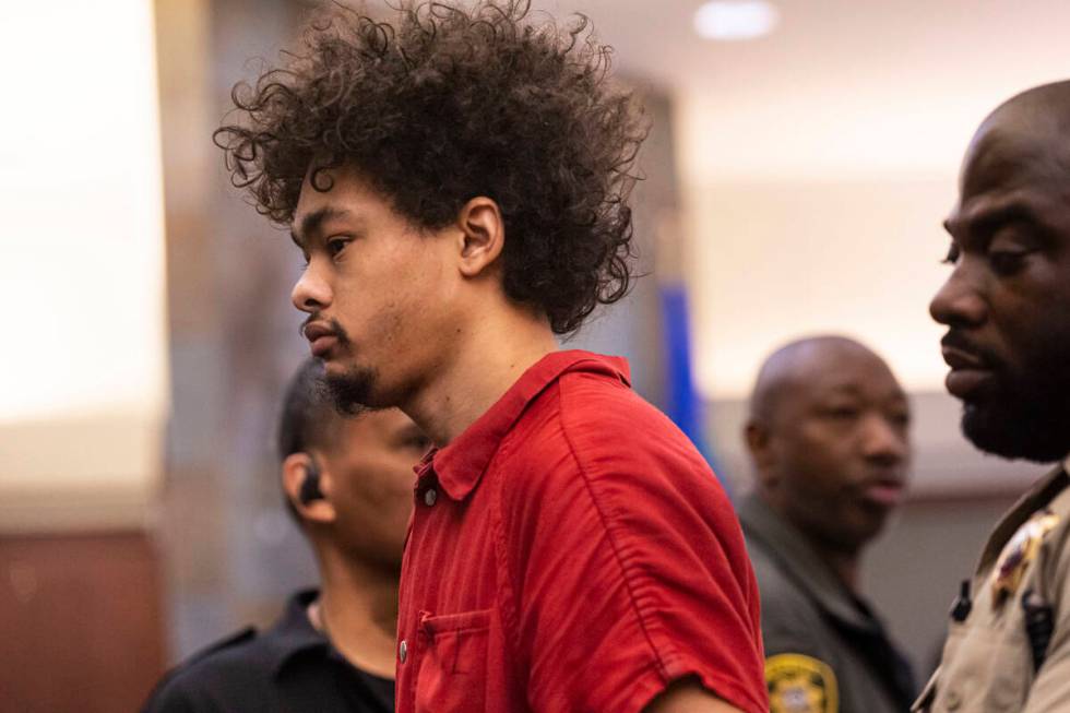 Tyson Hampton, charged in the fatal shooting of Las Vegas police officer Truong Thai, appears i ...