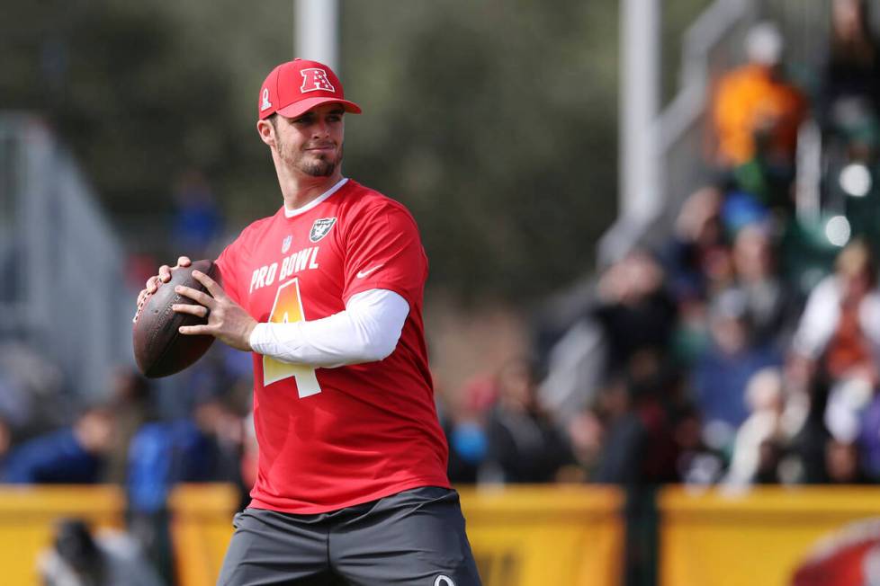 AFC quarterback Derek Carr, of the Oakland Raiders, prepares to throw a pass during Pro Bowl NF ...
