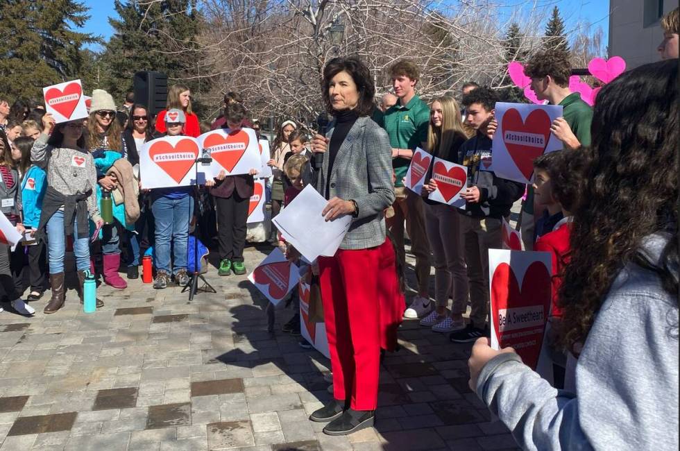 Sen. Heidi Seevers Gansert speaks to school choice advocates during a rally in front of the Nev ...