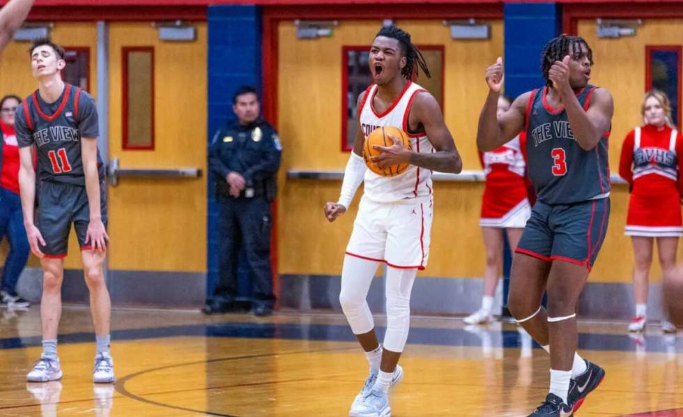 Coronado's Sebastian Mack (12) lis pumped after securing a late rebound from Arbor View's Brian ...