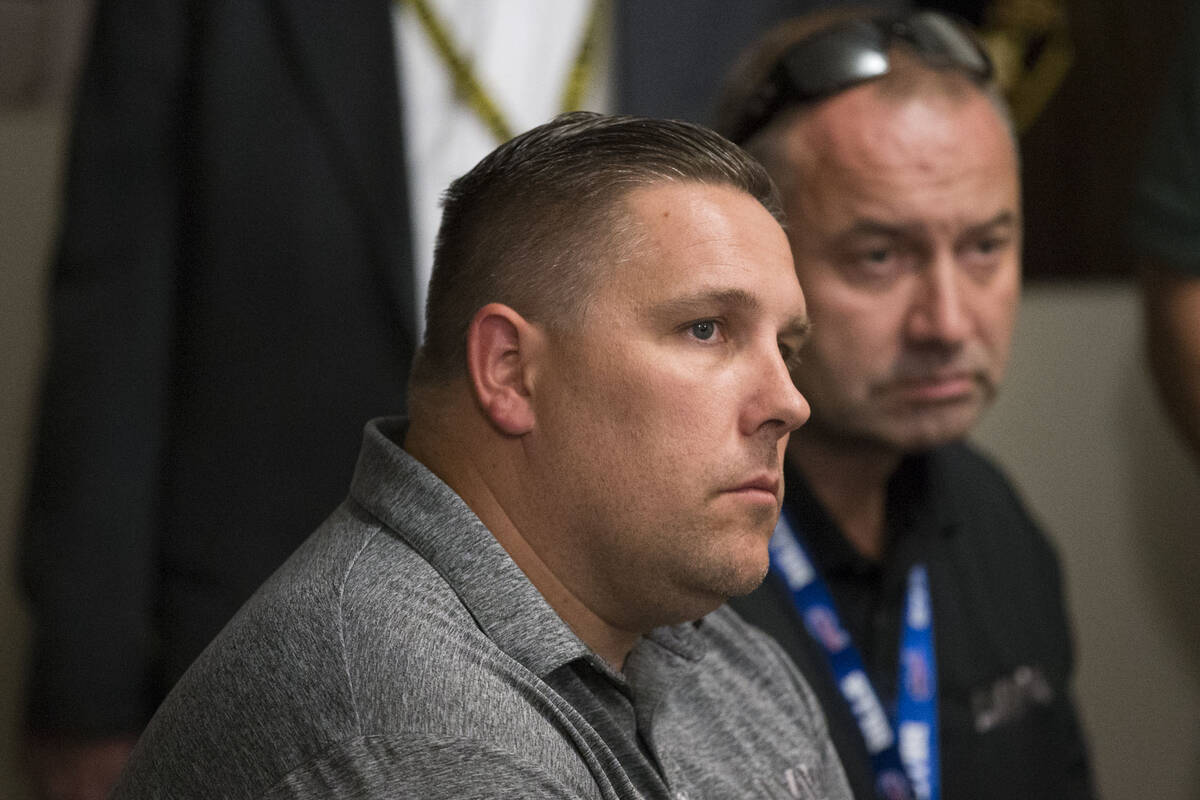 Steve Grammas, president of the Las Vegas Police Protective Association, left, is seen in Las V ...