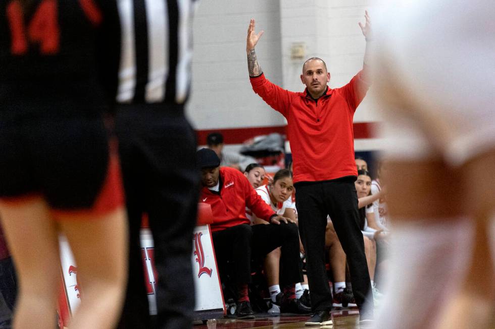 Liberty’s head coach Billy Hemberger reacts to a referee’s call during a Class 5A ...