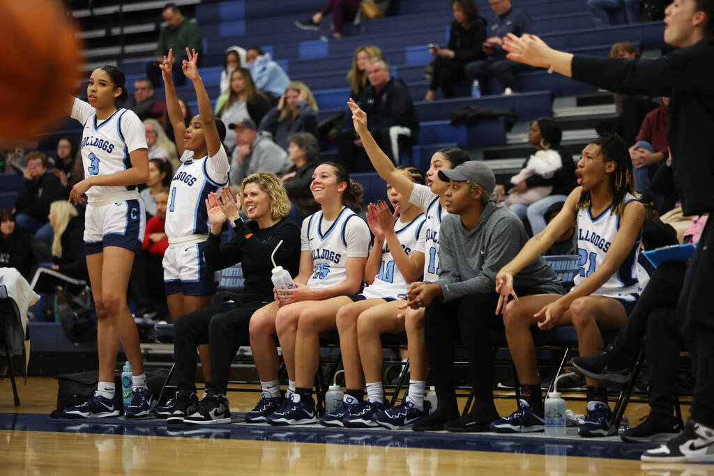 The Centennial bench reacts after a play against Faith Lutheran during a girls class 5A souther ...