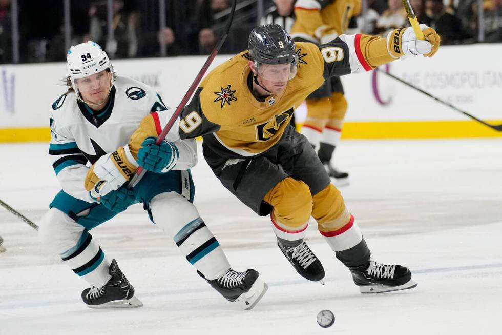 San Jose Sharks left wing Alexander Barabanov (94) and Vegas Golden Knights center Jack Eichel ...