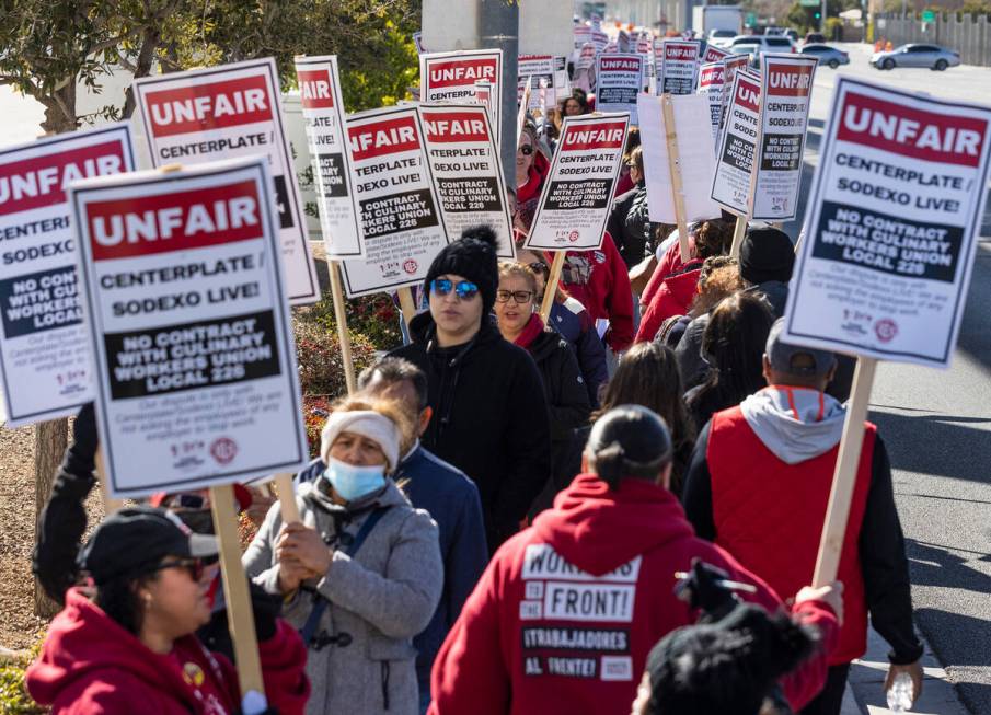 Culinary union workers picket in front of the Las Vegas Convention Center on Thursday, Feb. 16, ...