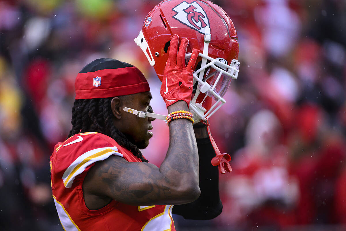 Kansas City Chiefs cornerback Chris Lammons puts his helmet on for warmups before an NFL divisi ...