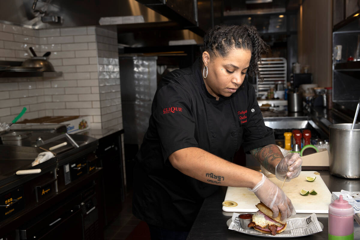 Marquita Duren, executive chef at Tailgate Social, plates a breakfast sandwich at the restauran ...