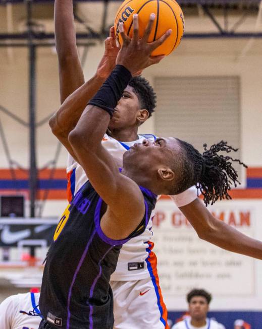 Durango's Tylen Riley (10) gets inside of Bishop Gorman's Jaxon Richardson (5) for a basket dur ...