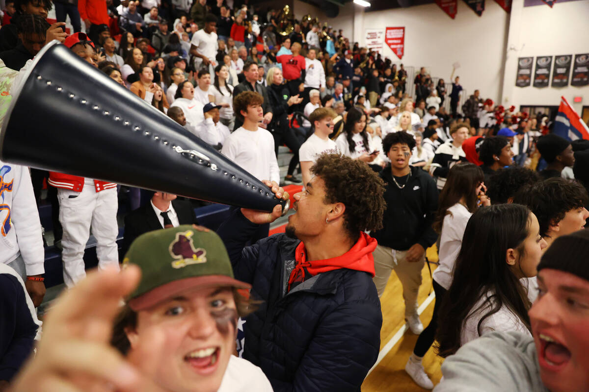 People cheer during a boys class 5A southern region semifinal game between Liberty and Coronado ...