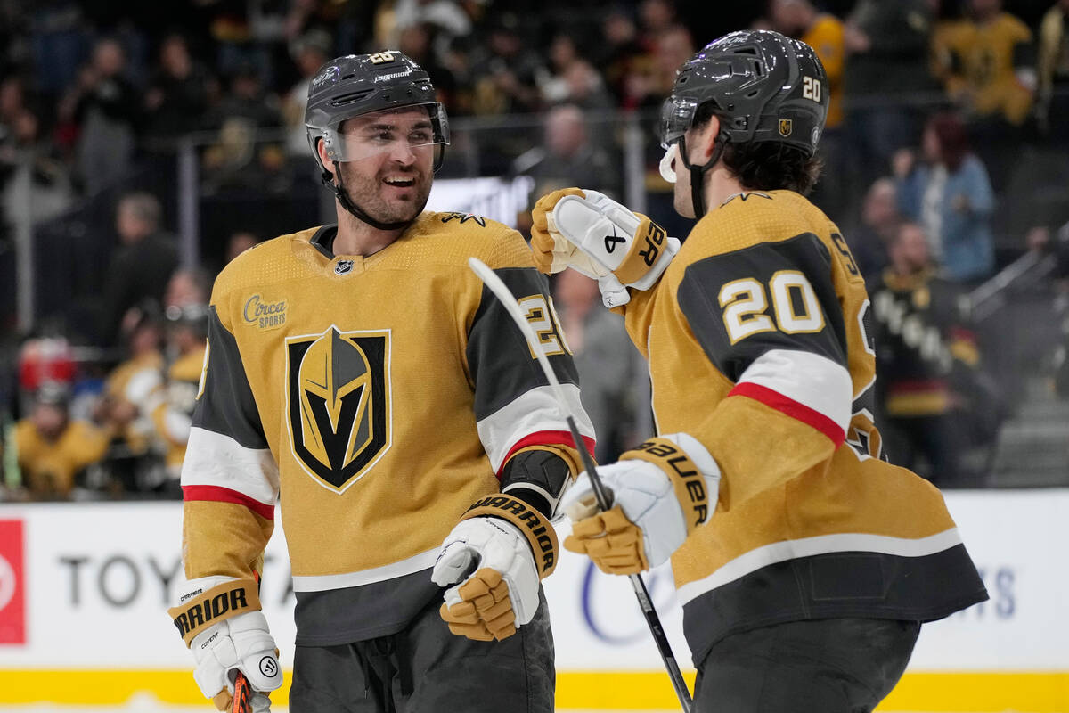 Vegas Golden Knights center Chandler Stephenson, right, celebrates after left wing William Carr ...