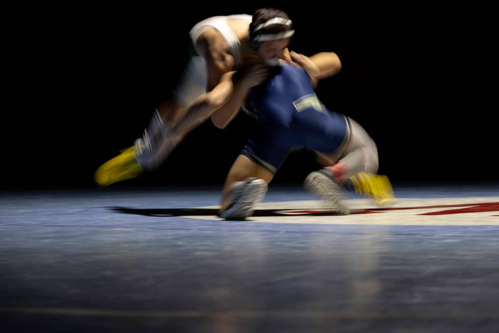 Rancho’s Caleb LeBaron and Cheyenne’s Matthew Salvador wrestle in the 120 lb weig ...