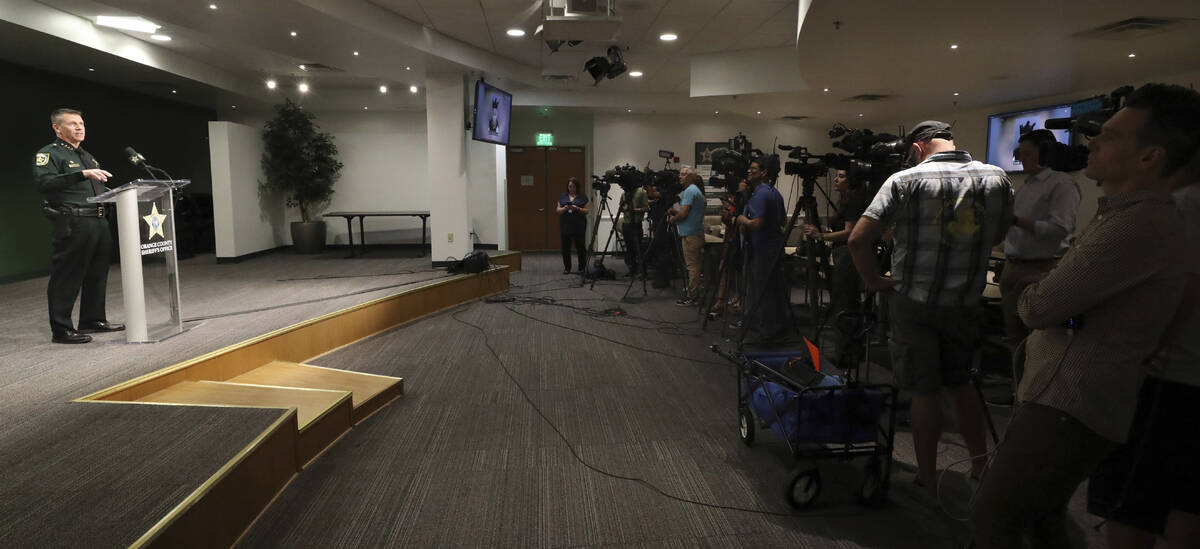 Orange County Sheriff John Mina addresses the media during a press conference about multiple sh ...