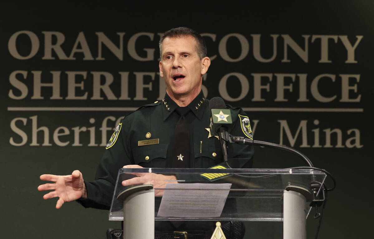 Orange County Sheriff John Mina addresses the media during a press conference about multiple sh ...