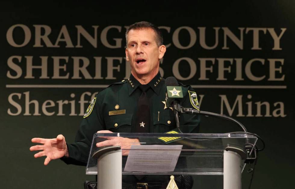 Orange County Sheriff John Mina addresses the media during a press conference about multiple sh ...