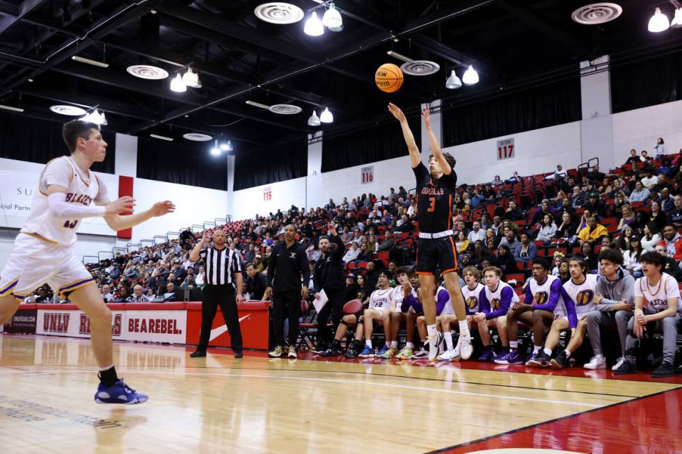 Douglas' Caden Thacker (3) takes a shot during a boys class 5A state semifinal game against Dur ...