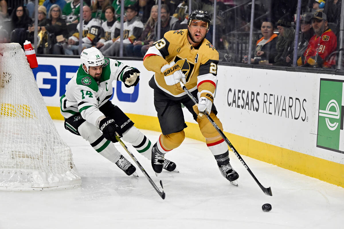 Vegas Golden Knights defenseman Alec Martinez (23) skates with the puck against Dallas Stars le ...