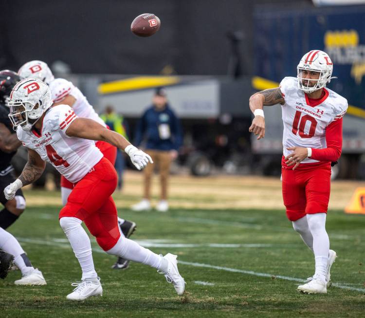 DC Defenders quarterback Jordan Ta’amu throws against the Vegas Vipers during the first ...