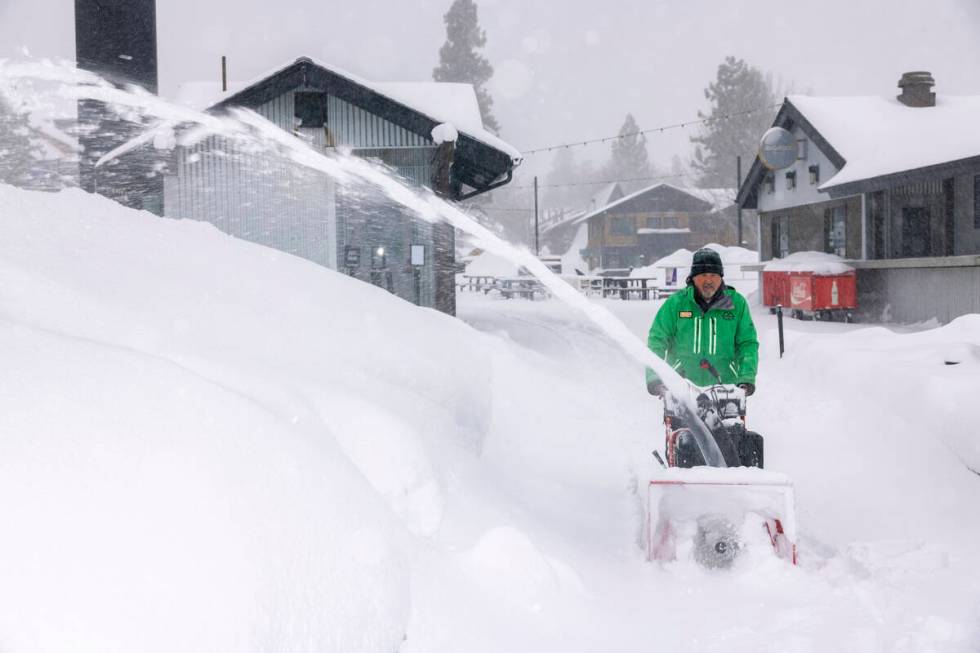 In this photo provided by Big Bear Mountain Resort, snow is removed at the resort in Big Bear, ...