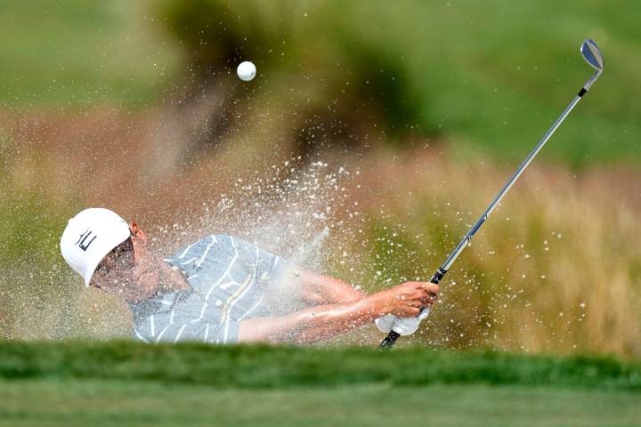 Justin Suh hits from a bunker onto the third green during the third round of the Honda Classic ...