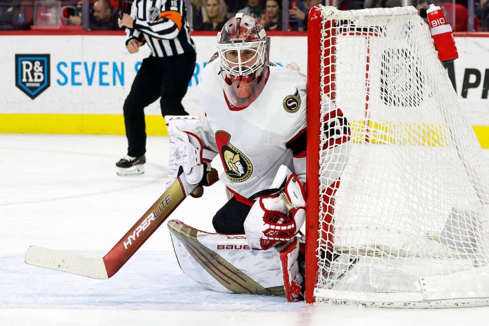 Ottawa Senators goaltender Cam Talbot (33) watches the puck against the Carolina Hurricanes dur ...