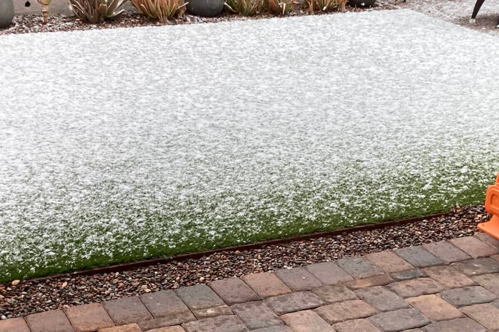 Snow accumulates outside a Summerlin home Wednesday, March 1, 2023, in Las Vegas. (Eli Segall/L ...