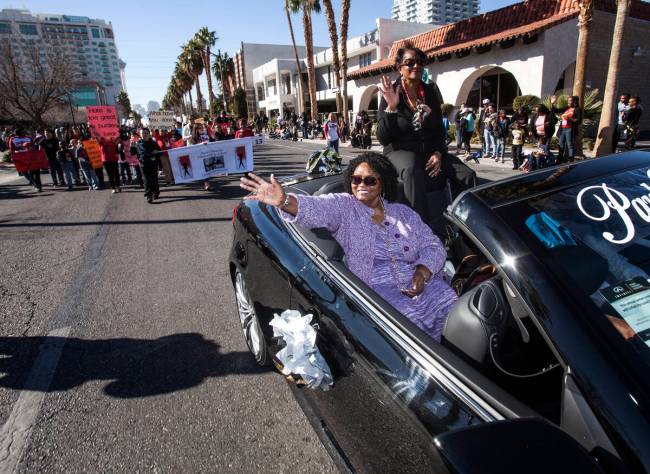 Ruby Duncan, a longtime advocate for civil and welfare rights in Las Vegas, waves to the crowd ...
